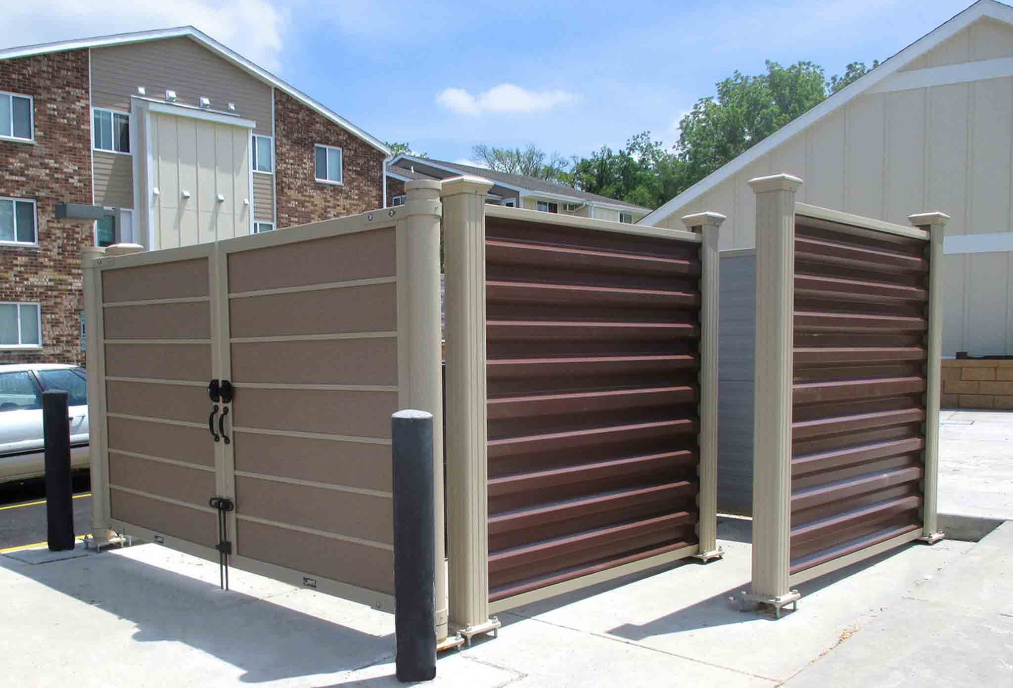 A 76 FENCE Schaumburg commercial dumpster enclosure gates.